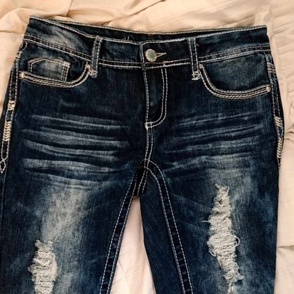 Ripped blue jeans